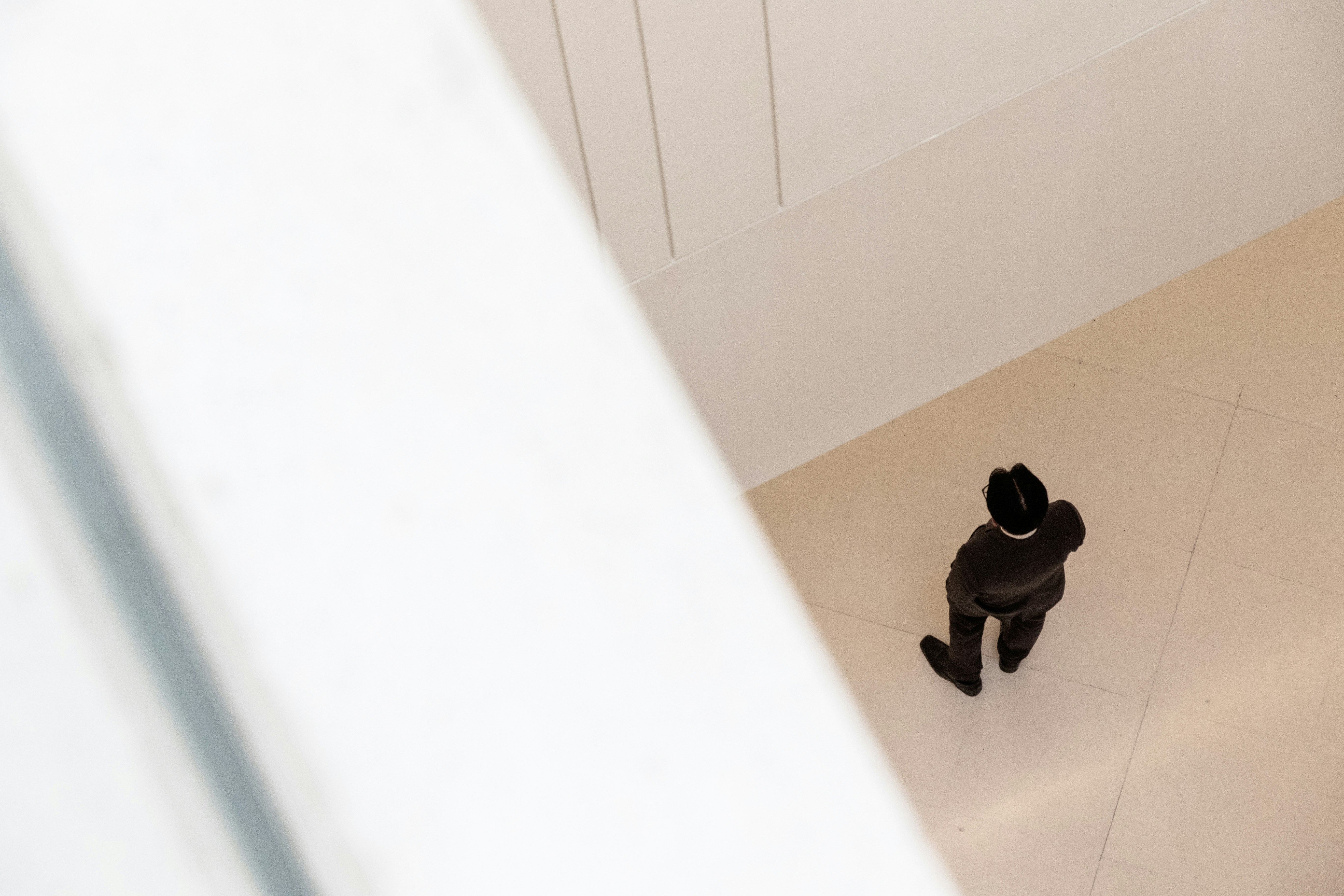 man-standing-in-corner